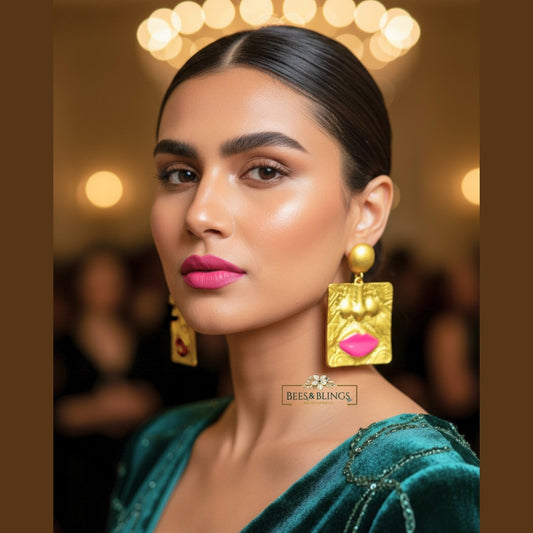 Golden-abstract-face-earrings
