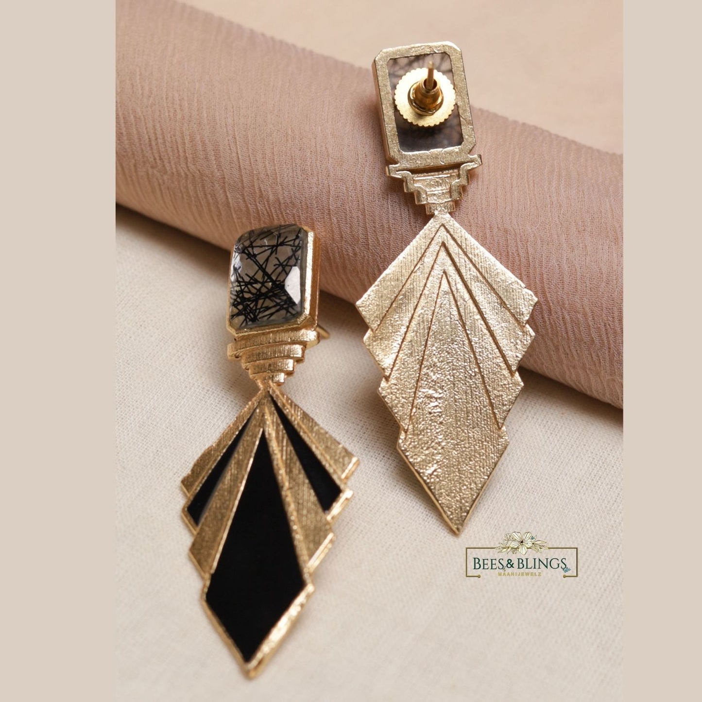 goldplated black statement earrings