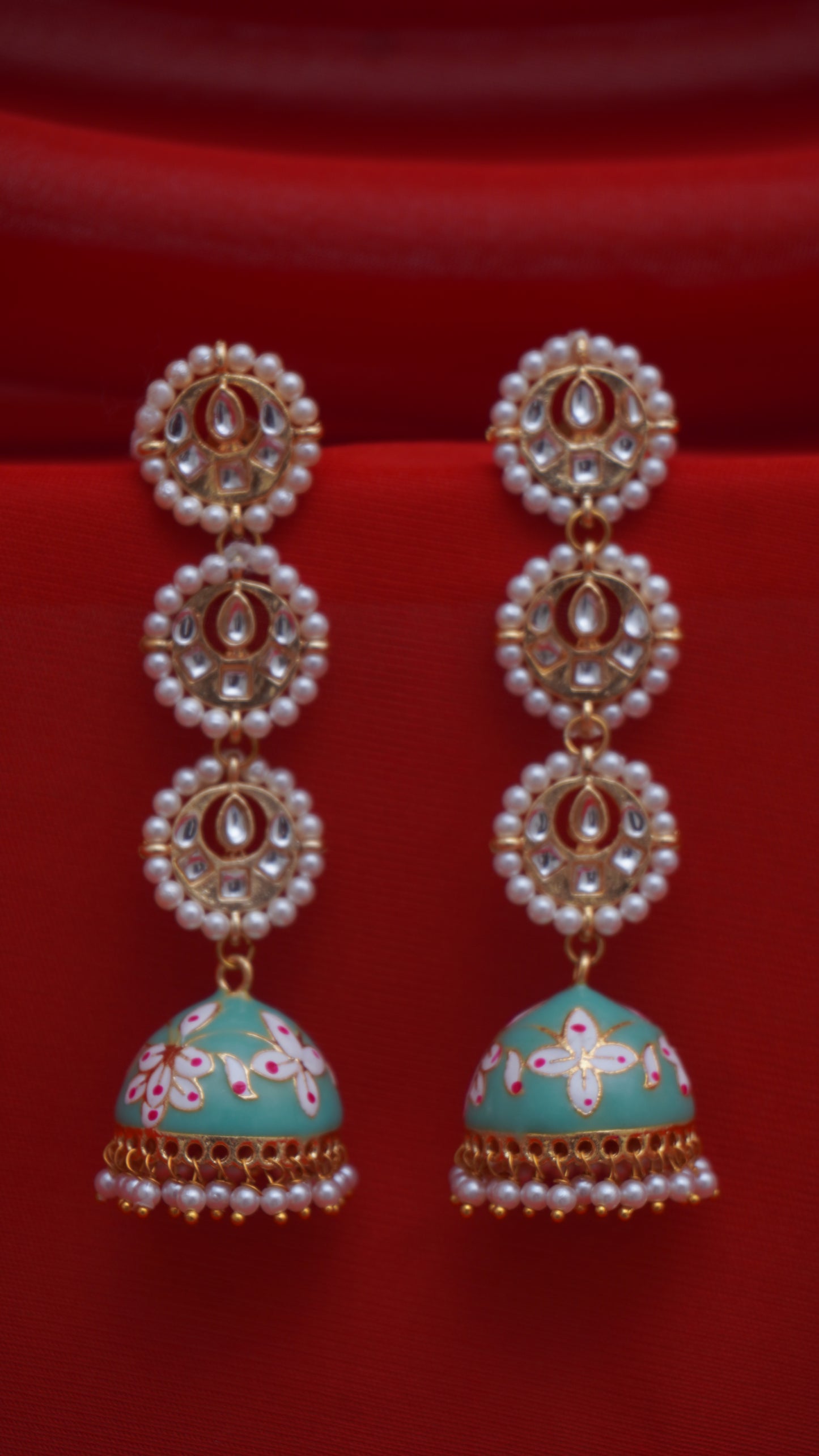 c-green kundan jhumkis