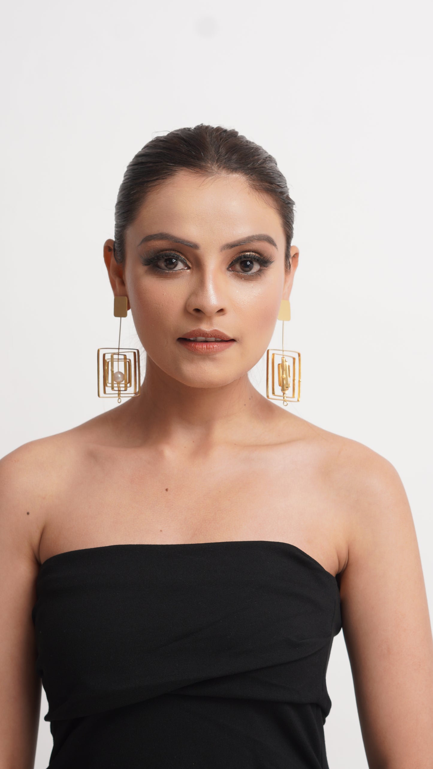 gold plated-twirling bead-long-earrings
