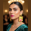 Golden-abstract-face-earrings