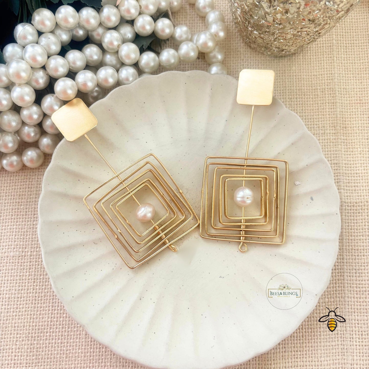 gold plated-twirling bead-long-earrings
