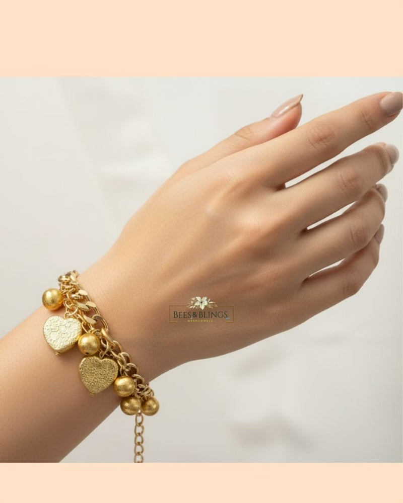 Gold heart statement bracelet