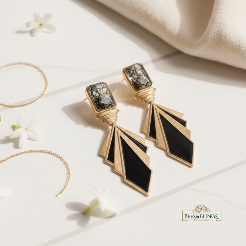 goldplated black statement earrings