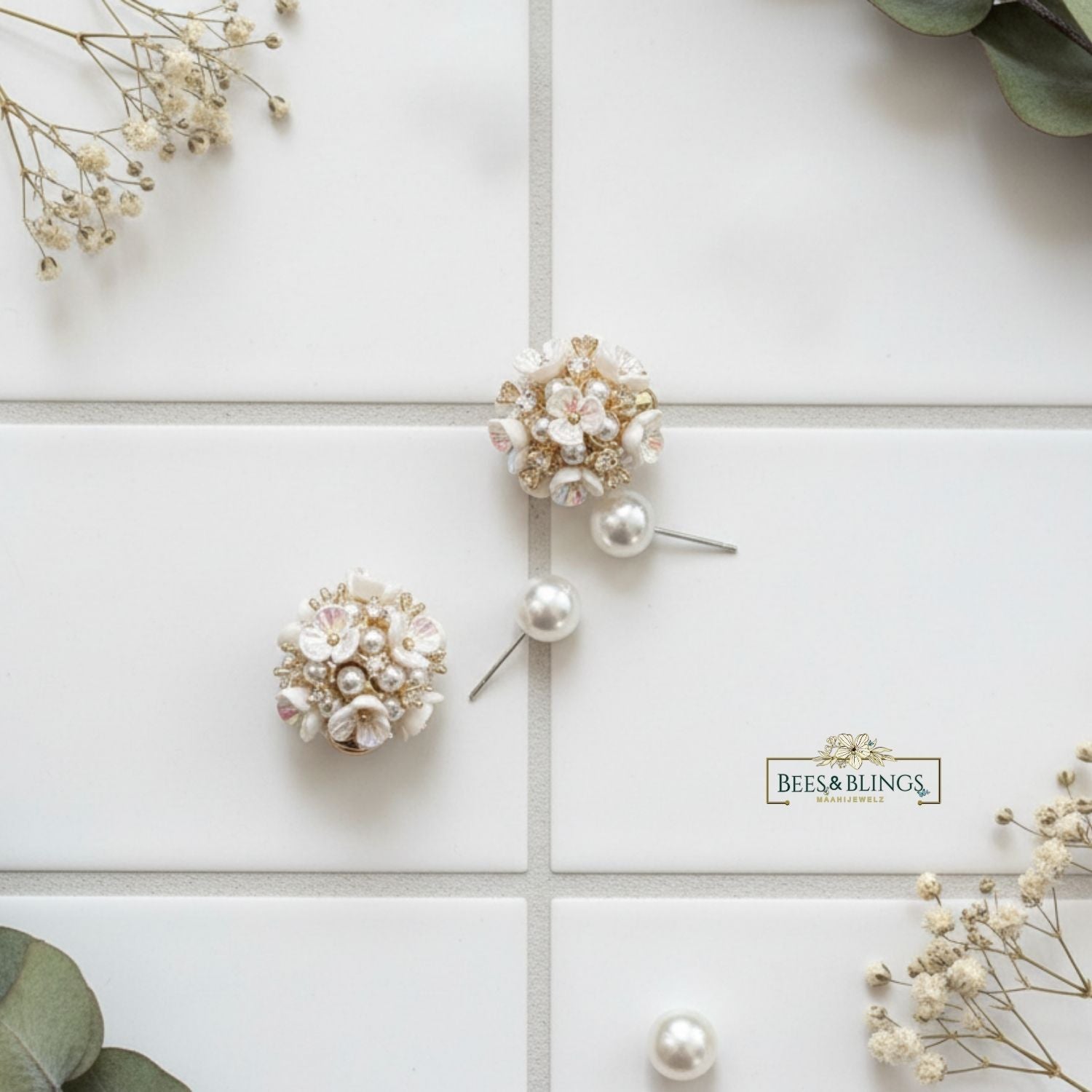 dual-pearl-statement-studs