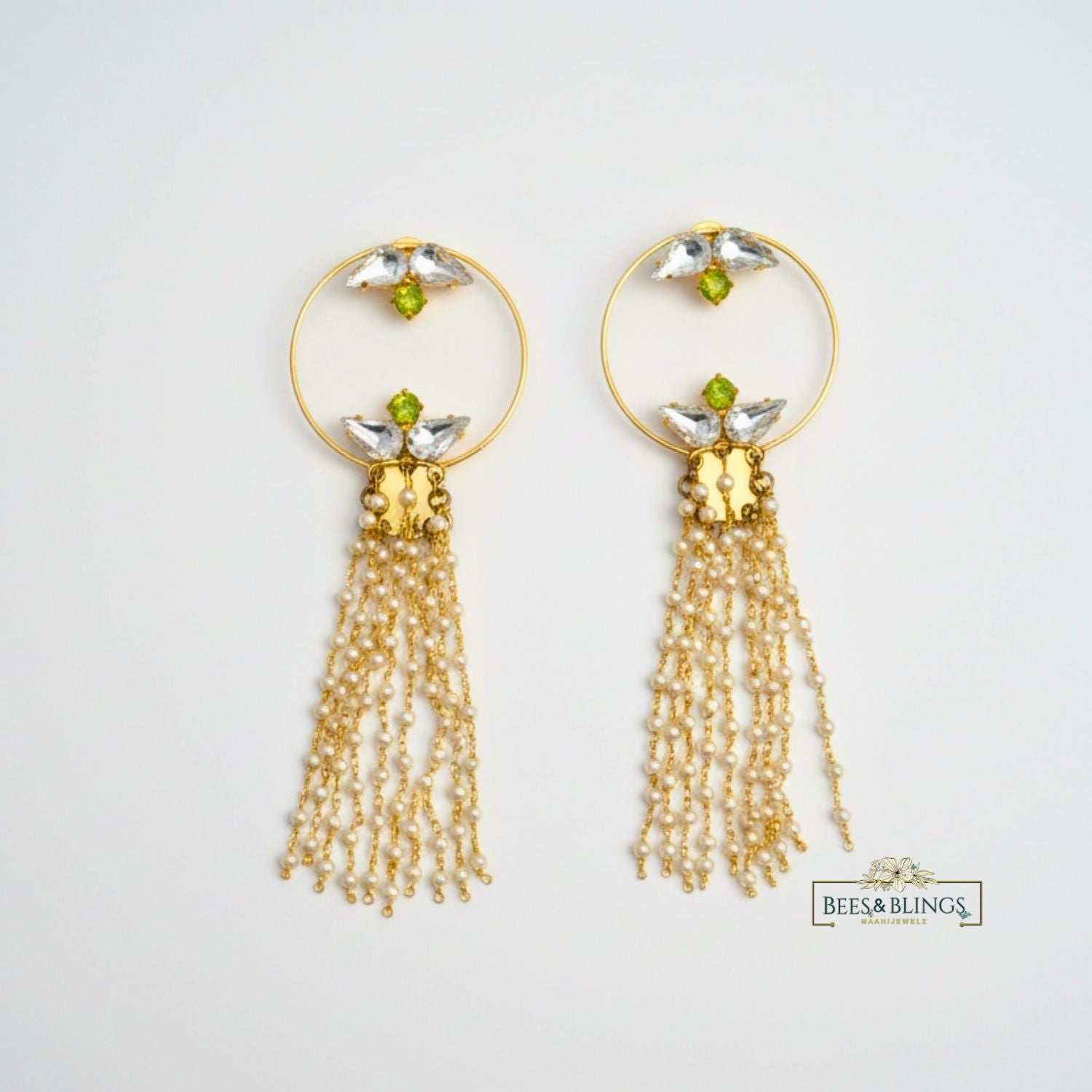gold-pearl-tassel-statement-earrings