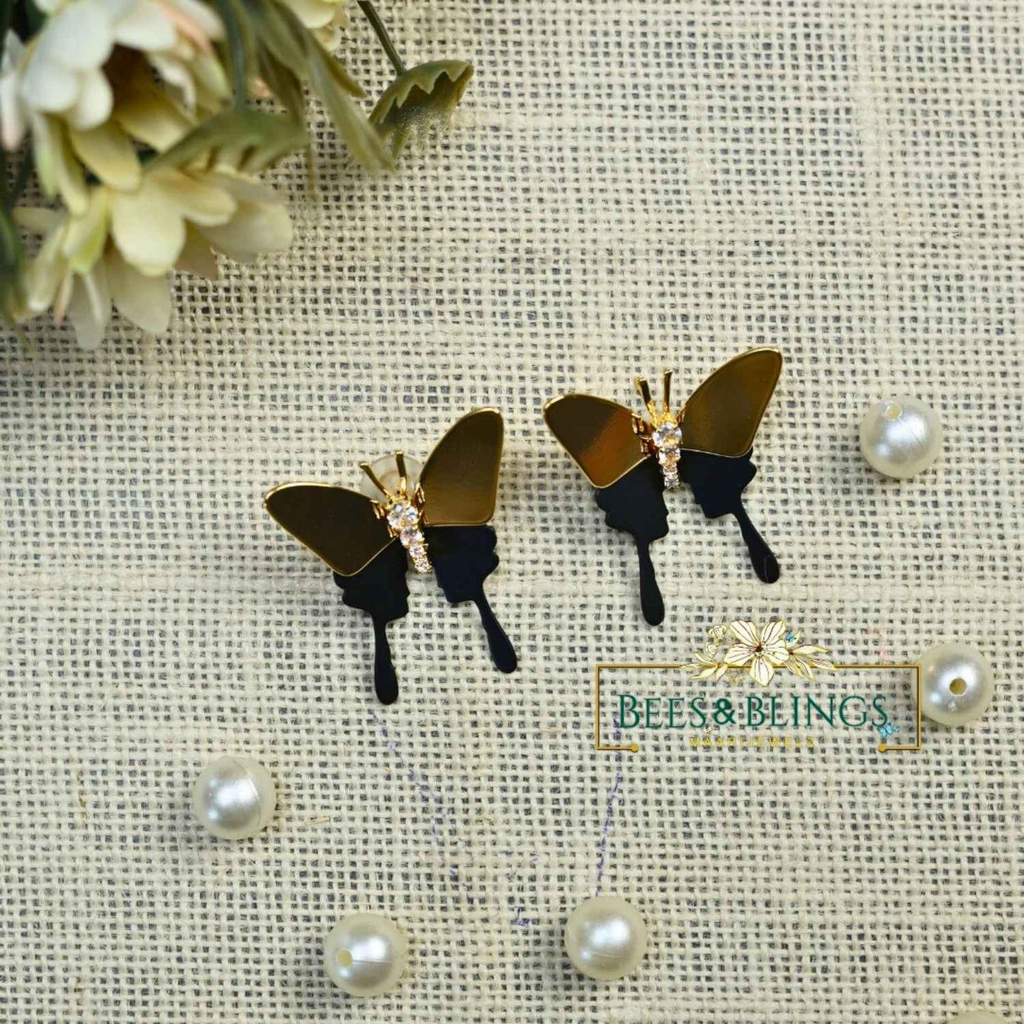 golden-black-butterfly-statement-studs