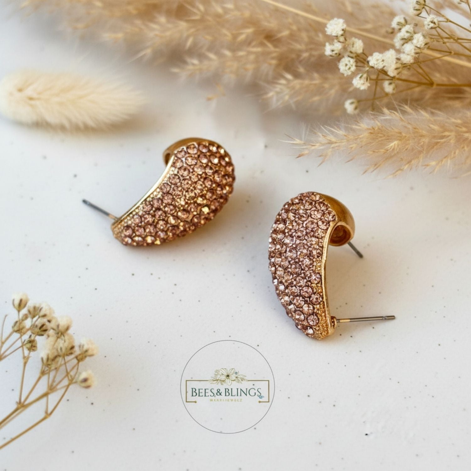 golden-teardrop-statement-studs-earrings