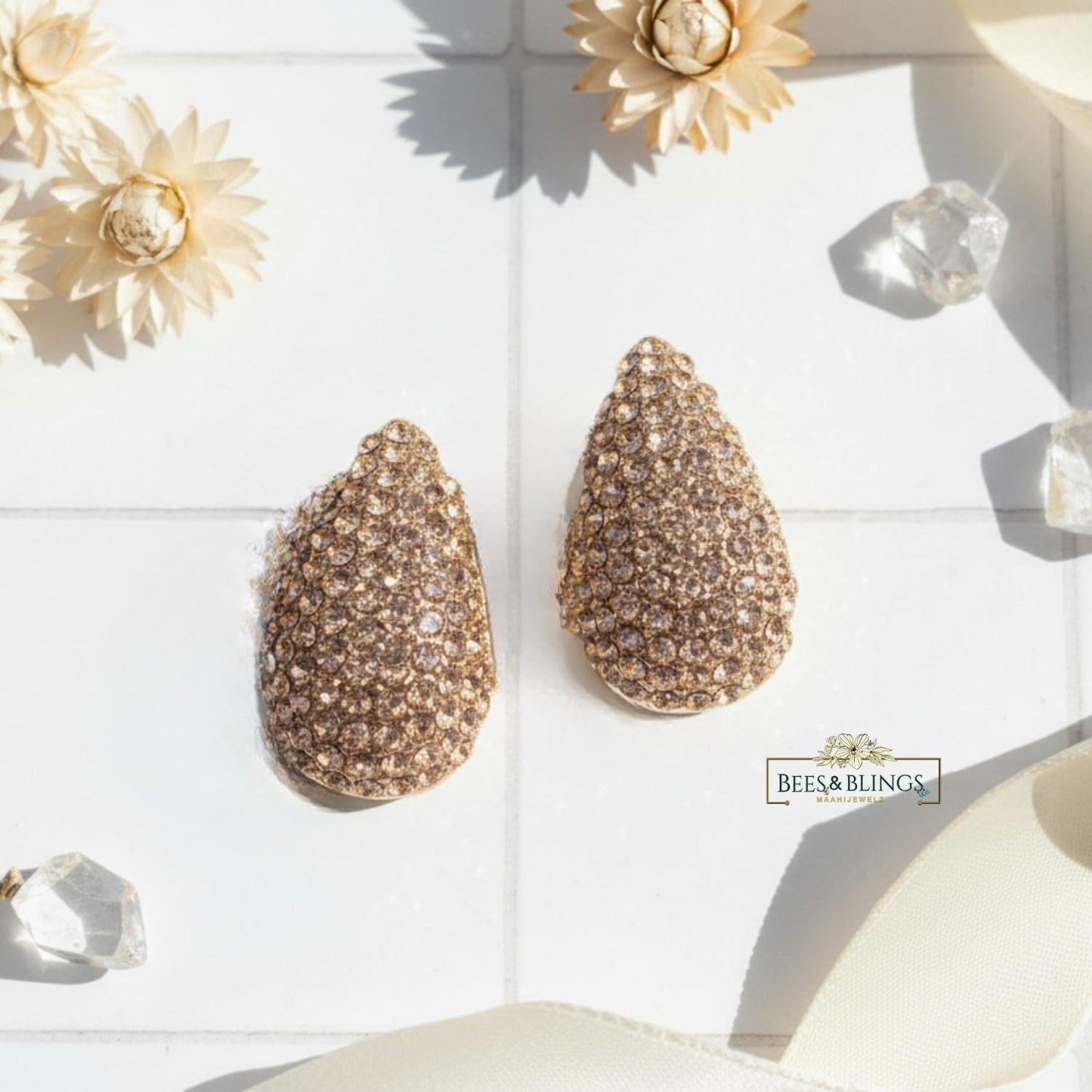 golden-teardrop-statement-studs