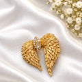 golden_feather_statement_ring