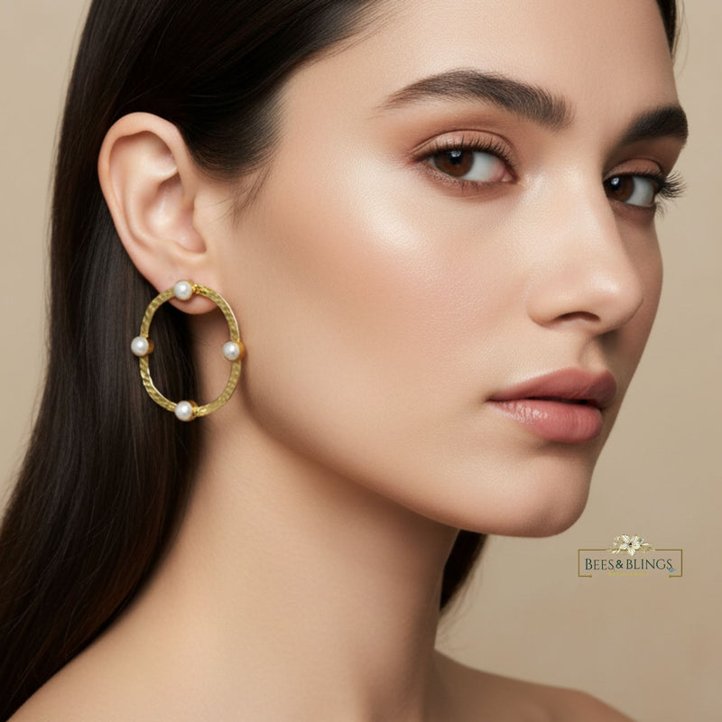 golden hoop statement earrings