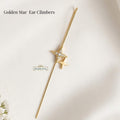 Golden star statement ear climbers