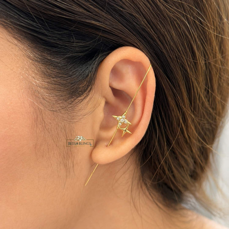 Golden star statement ear climbers