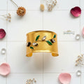 Golden statement hand accessory