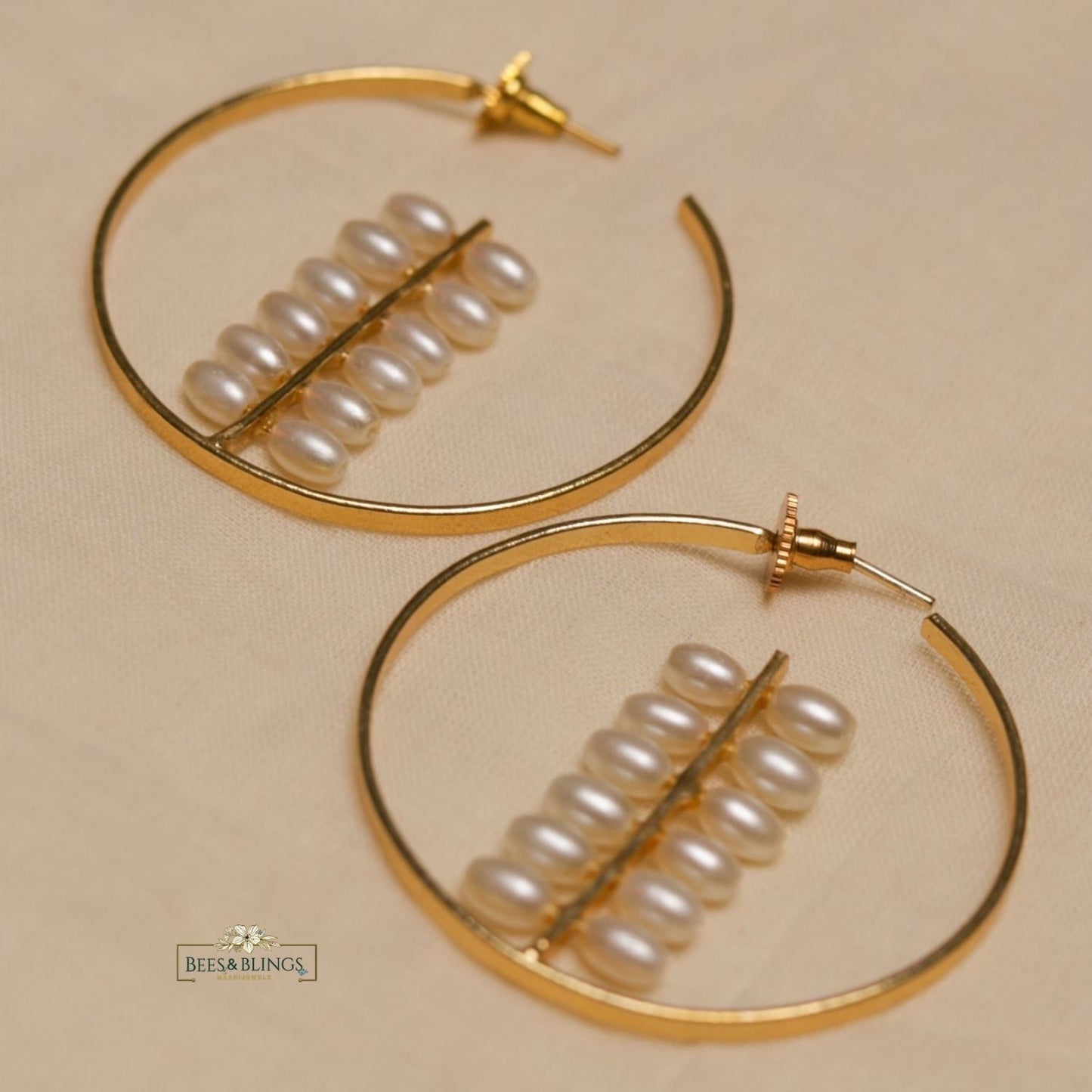golden pearl hoop statement earrings