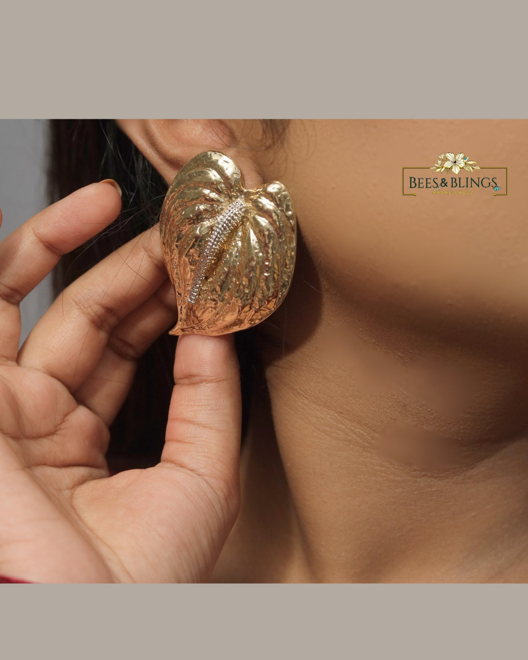 goldplated leaf statement earrings