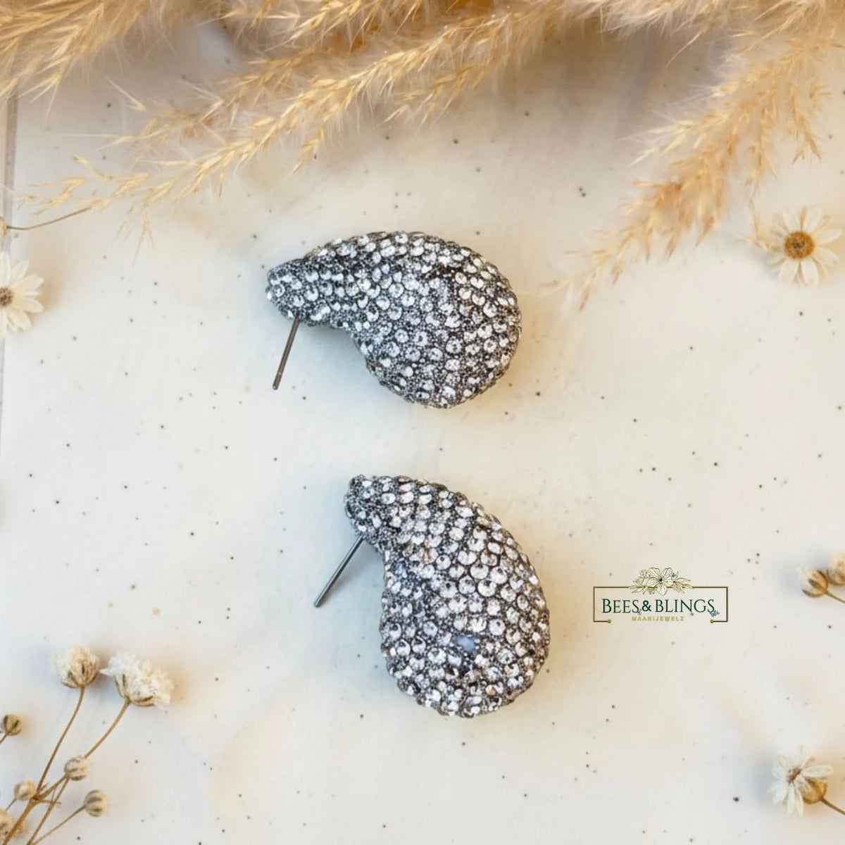 silver-tear-drop-studs