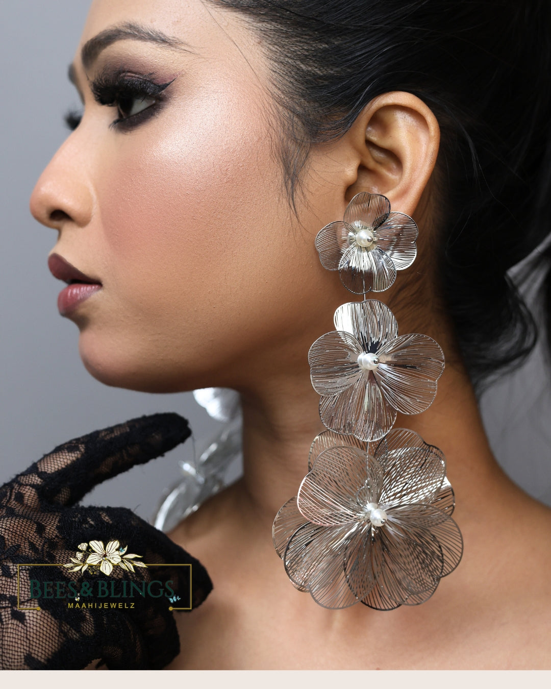 silver-floral-long-party-earrings