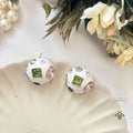 white-enamel-studs-statement-earrings
