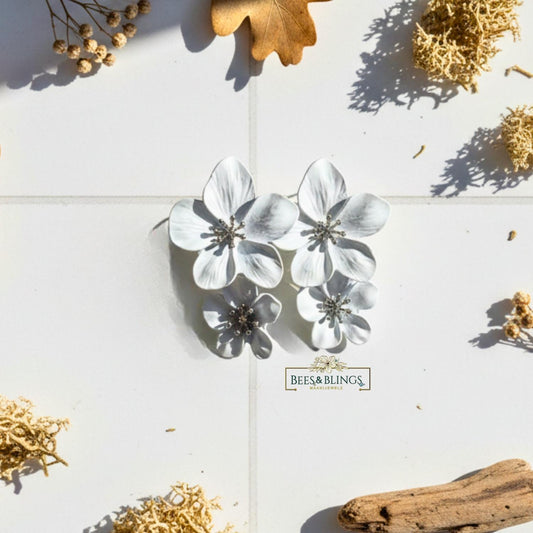 white-floral-studs