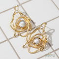 gold pearl abstract statement earrings