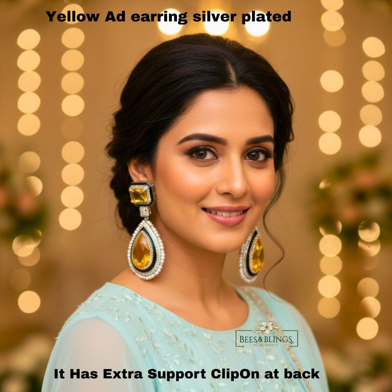 yellow ad drop statement earrings